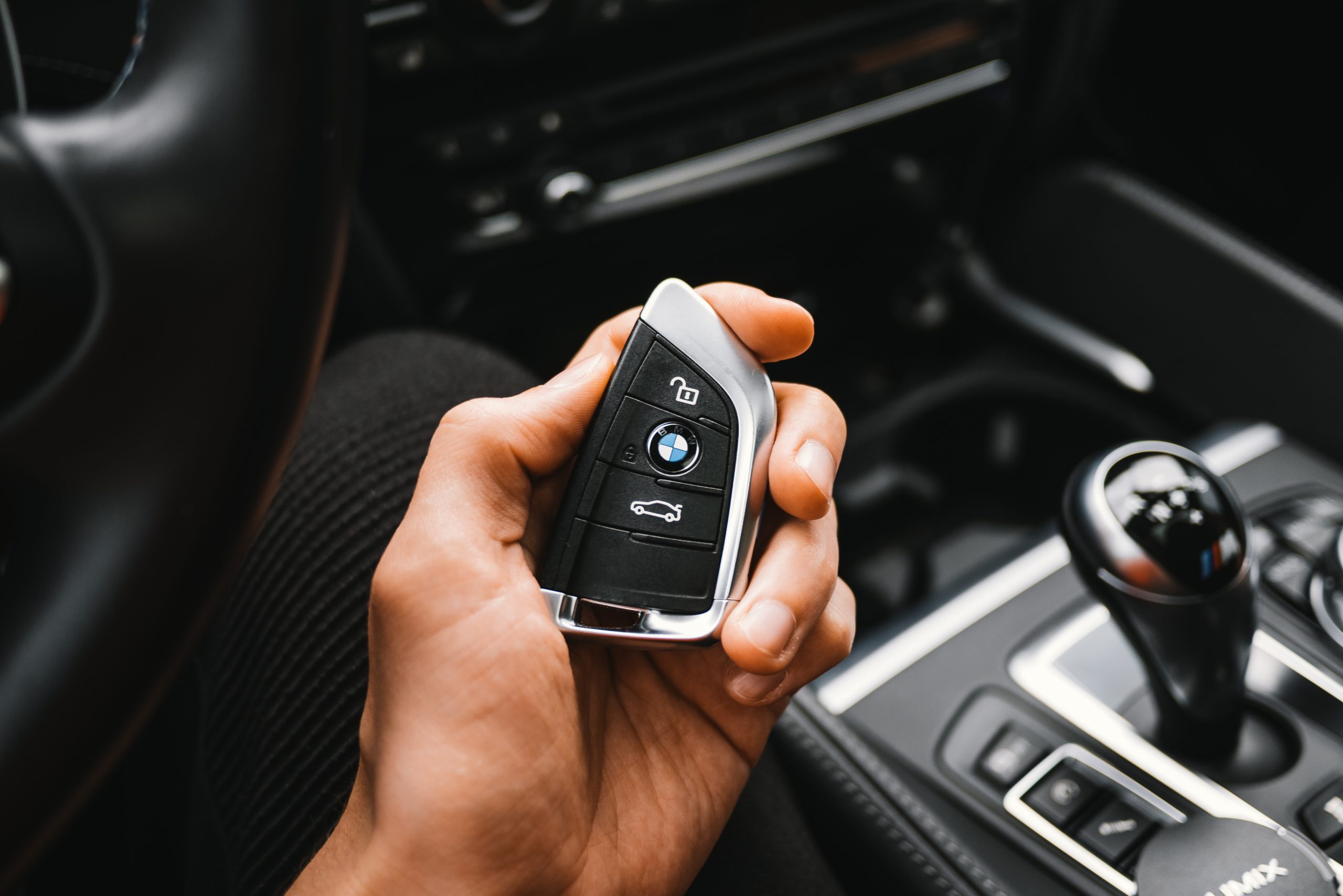 man-holding-bmw-m-sport-car-key-picjumbo-com